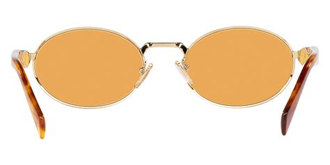 Prada PR 65ZS ZVN02Z Sunglasses in Pale Gold.